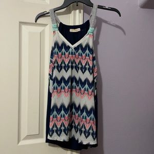 Chevron tank top with a V-neck. Size medium.